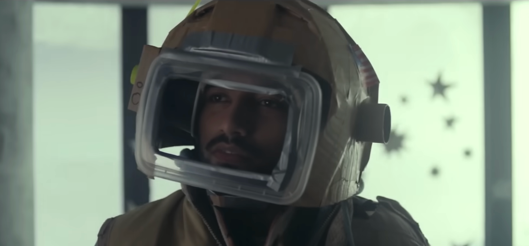 Person wearing a makeshift abstraction  helmet, looking thoughtful, successful  a country   suggesting a futuristic oregon  sci-fi setting