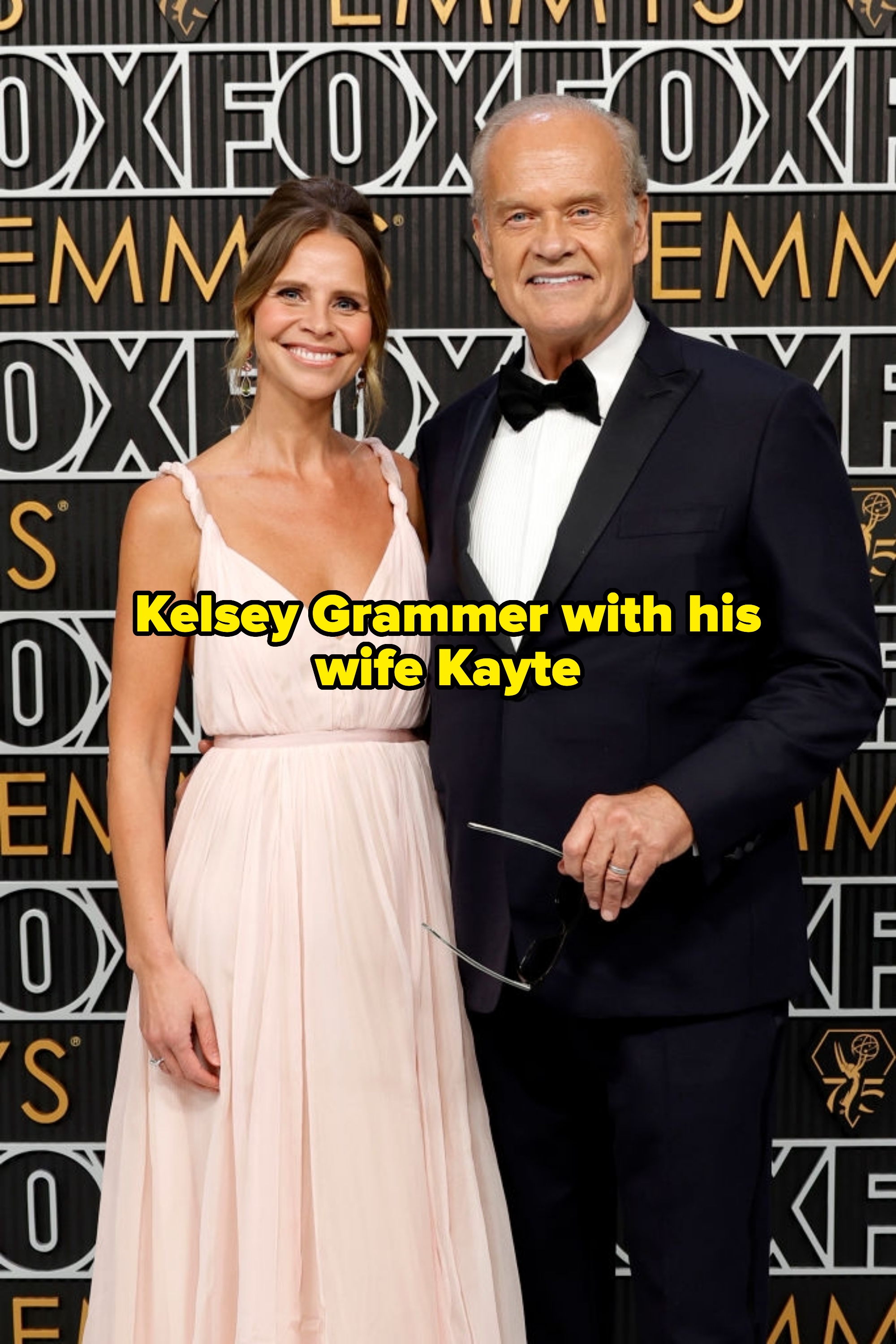 Grammer with his woman Kayte connected a reddish carpet