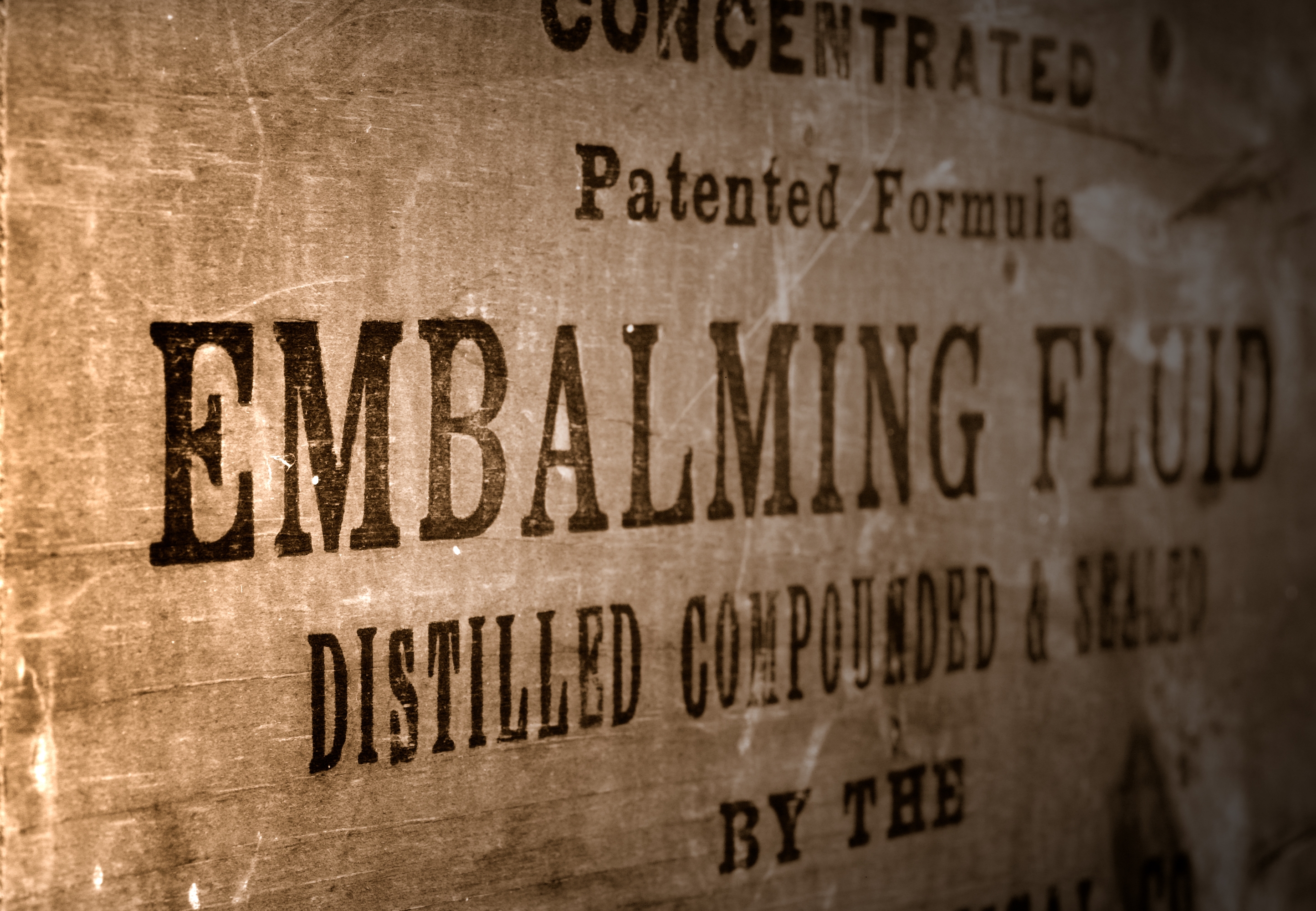 Old statement   for embalming fluid, highlighting &quot;Concentrated Patented Formula,&quot; &quot;Distilled Compounded &amp;amp; Refined.&quot;