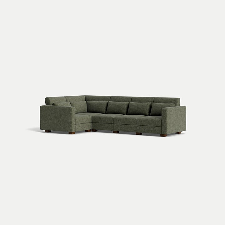 Modern sectional sofa with plush cushions and a clean, minimalist design, suitable for contemporary living spaces