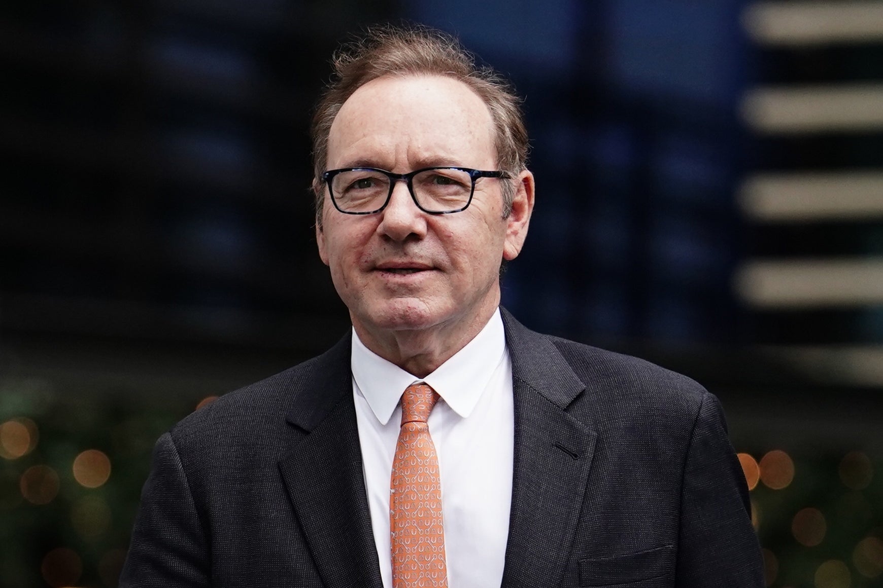 Kevin Spacey walking outdoors