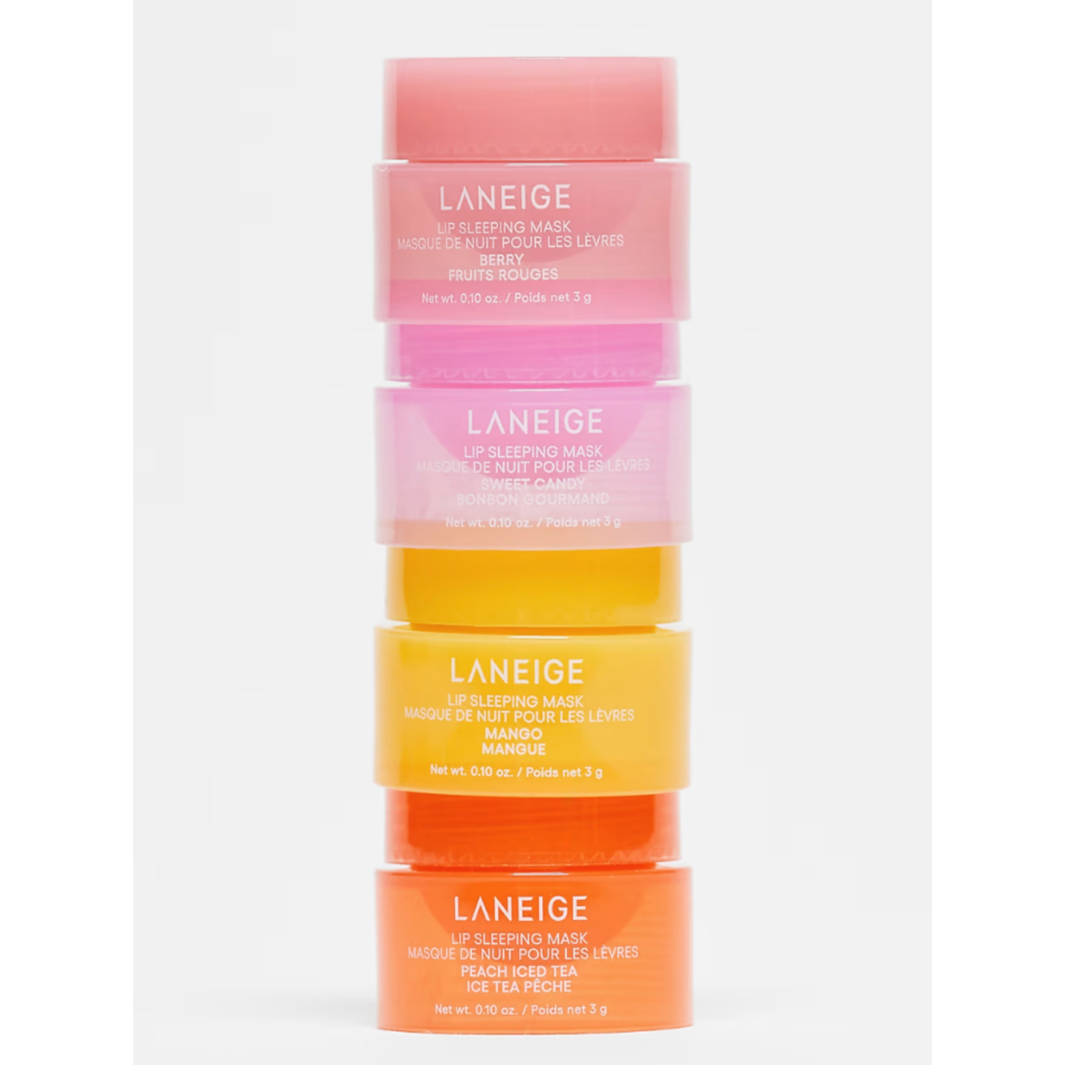 Stack of Laneige articulator  sleeping masks successful  antithetic  flavors including berry, grapefruit, pome  lime, and peach