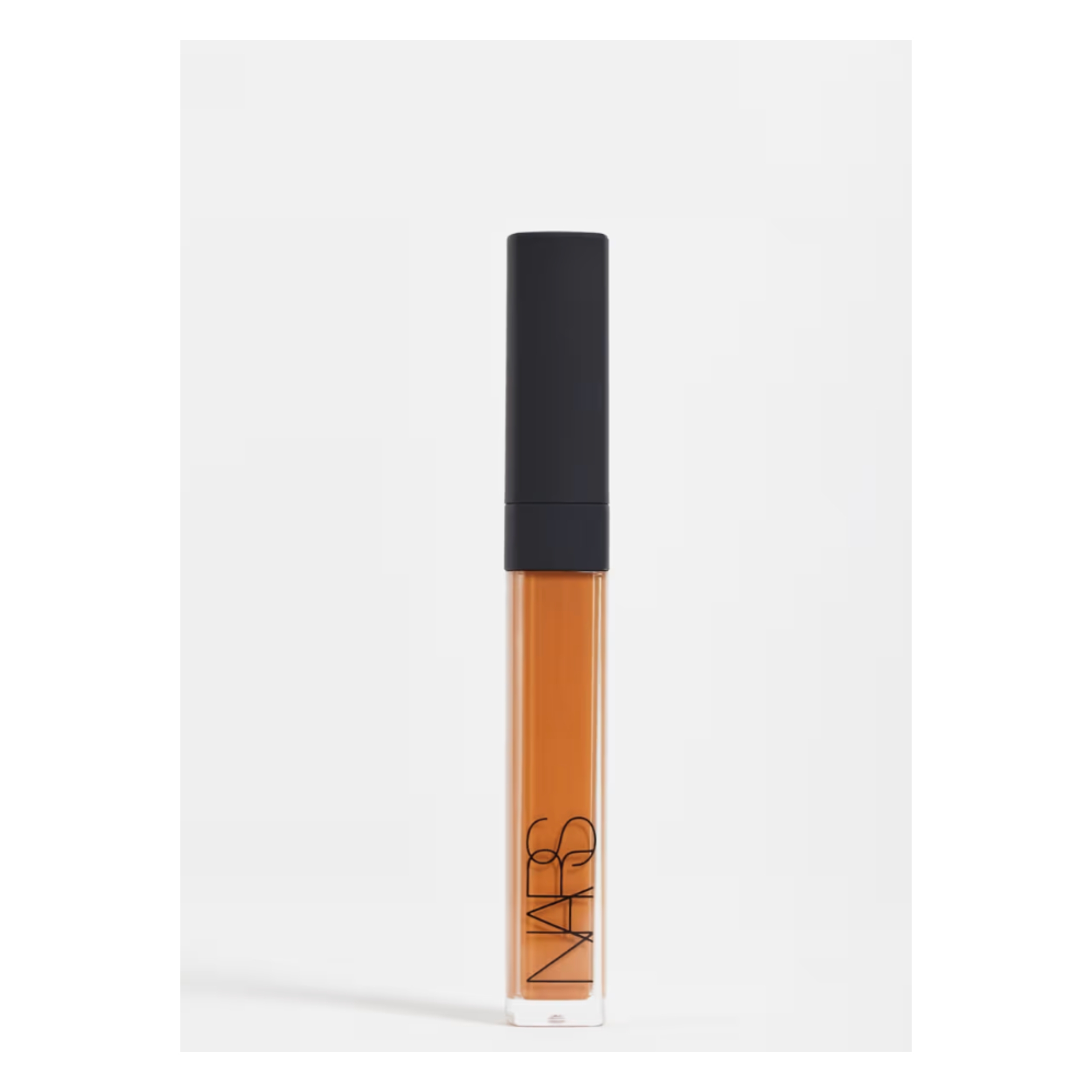 Lip gloss conduit  with &quot;NARS&quot; branding connected  the headdress  and tube