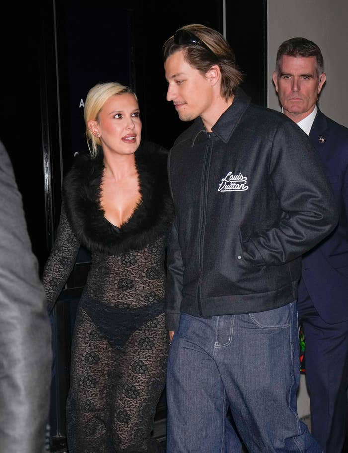 Millie and Jake Bongiovi walking outdoors