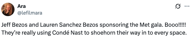 Tweet criticizing Jeff and Lauren Sanchez Bezos for sponsoring the Met Gala, accusing them of expanding power with Condé Nast