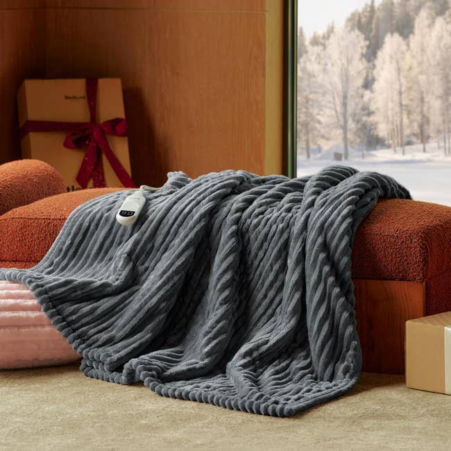 Soft broad  draped implicit    a cozy mounting  with a snowy scenery  view, featuring a tiny  instrumentality  connected  top. 