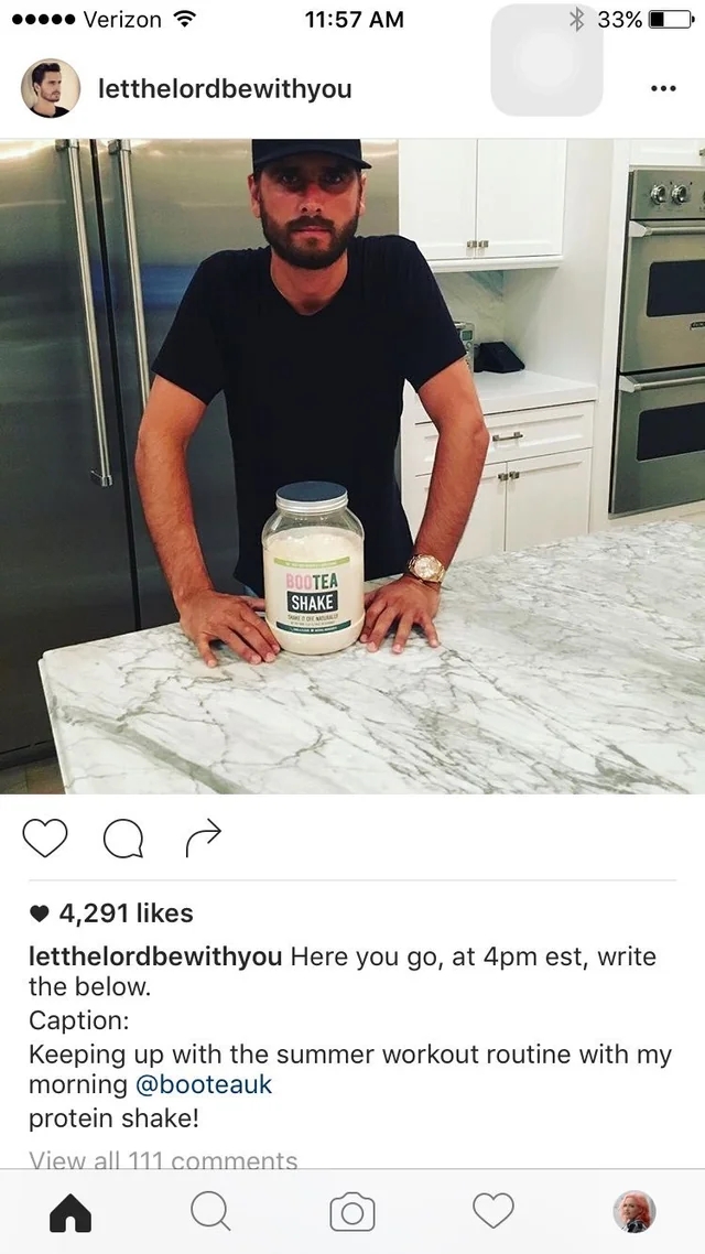 Person in casual clothing stands in kitchen with a protein shake jar. Instagram caption discusses summer workout routine