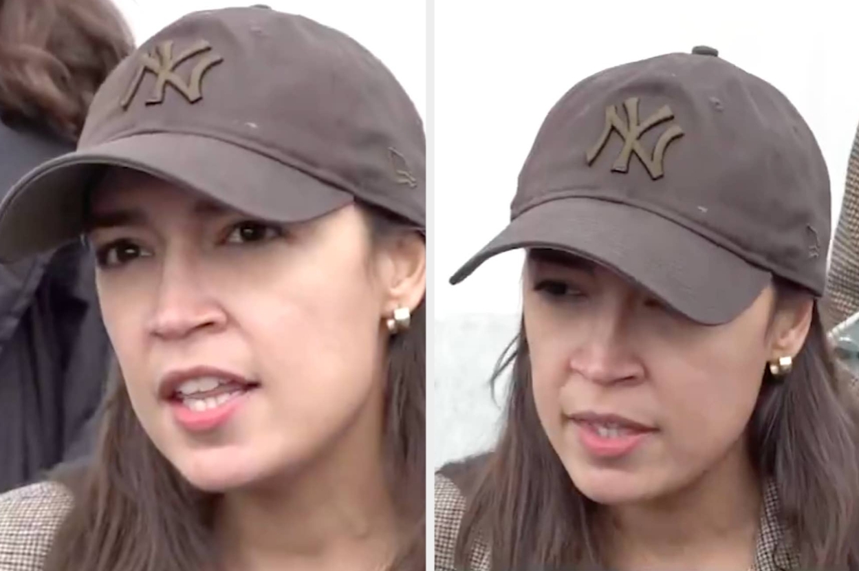 Person wearing a New York Yankees cap and pearl earrings, speaking outdoors