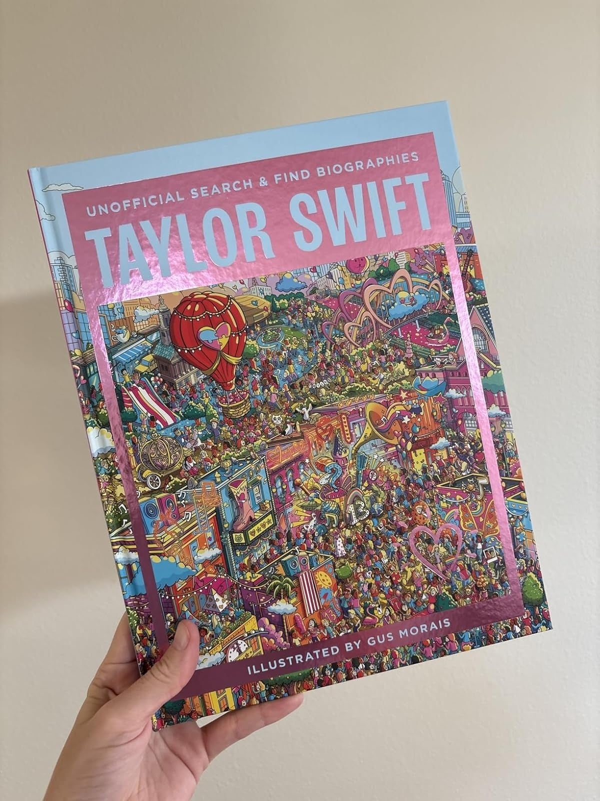 Person holds the publication  
