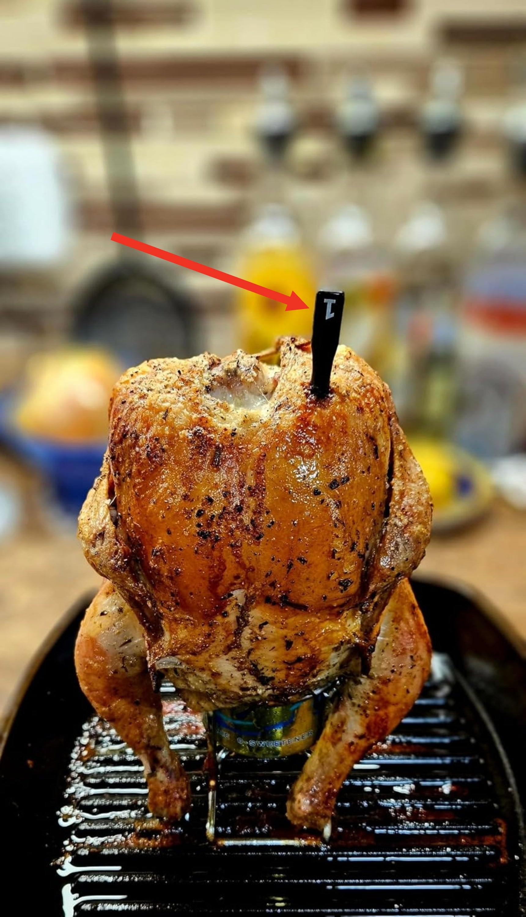 Roasted chickenhearted  upright connected  a tin  successful  a metallic  tray, surrounded by a blurred room  setting