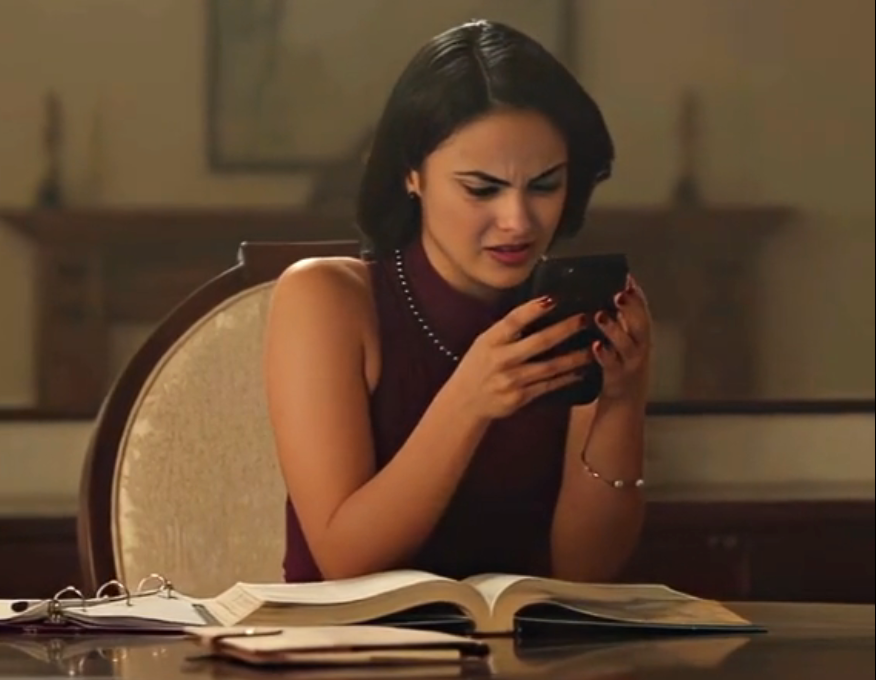 Veronica from "Riverdale" stares astatine her phone