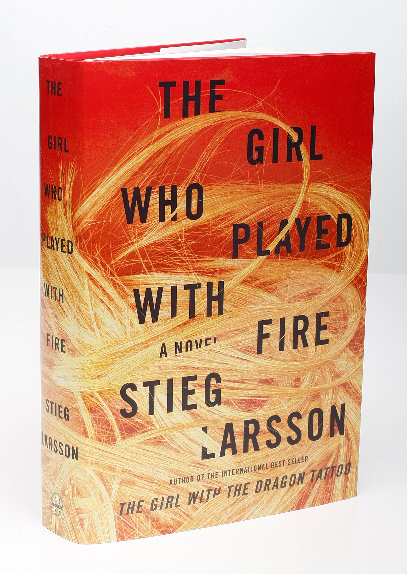 Book screen  for "The Girl Who Played with Fire" by Stieg Larsson, featuring dynamic swirling graphics
