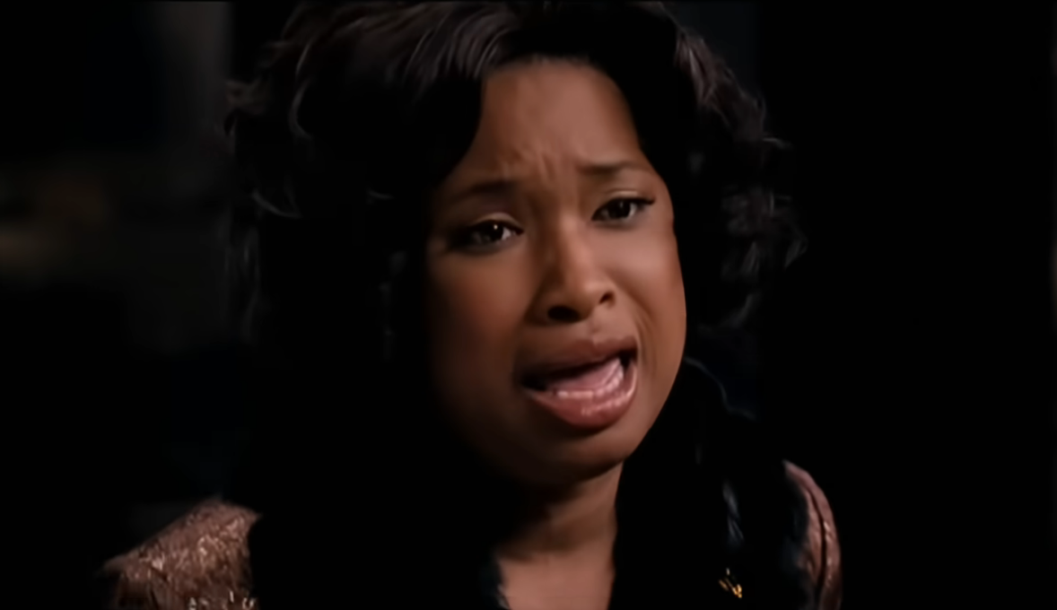 A idiosyncratic   passionately singing with an affectional  expression, wearing a acheronian  outfit with a decorative collar