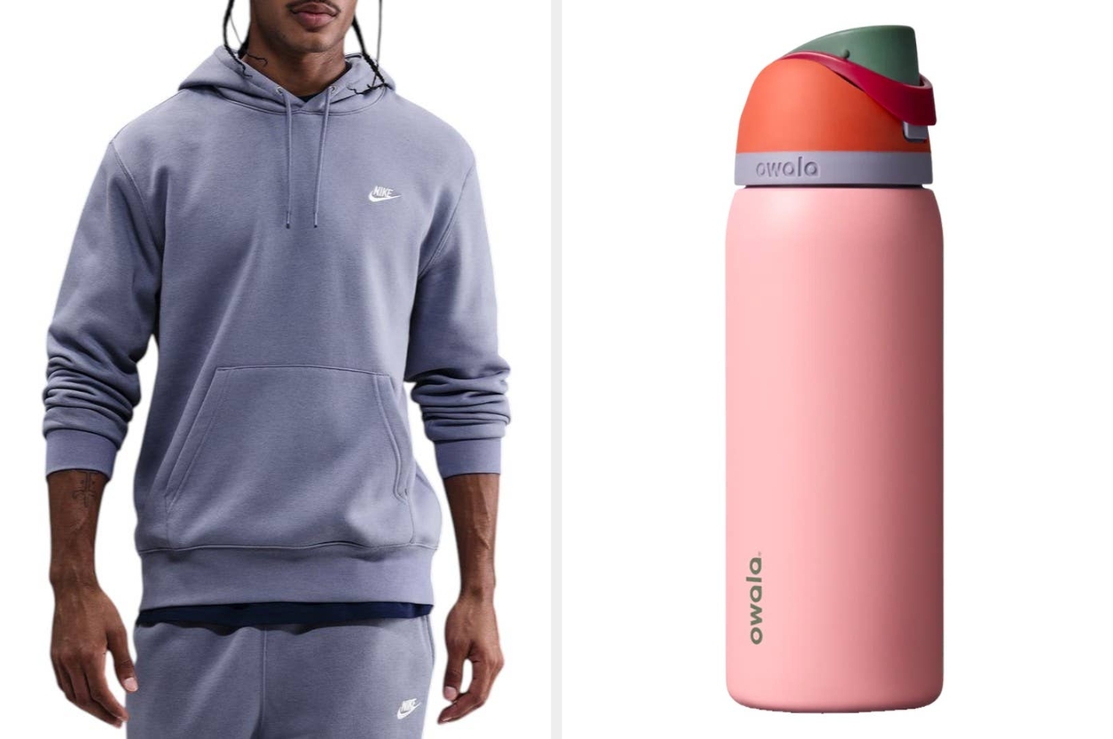 Person in a Nike tracksuit next to a pink Owala water bottle with a red lid