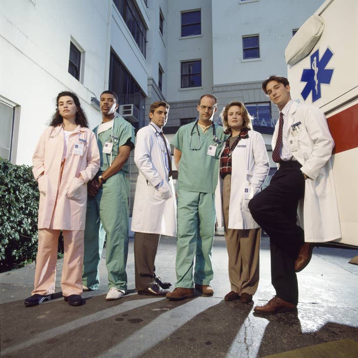 Various people dressed as doctors, standing outdoors