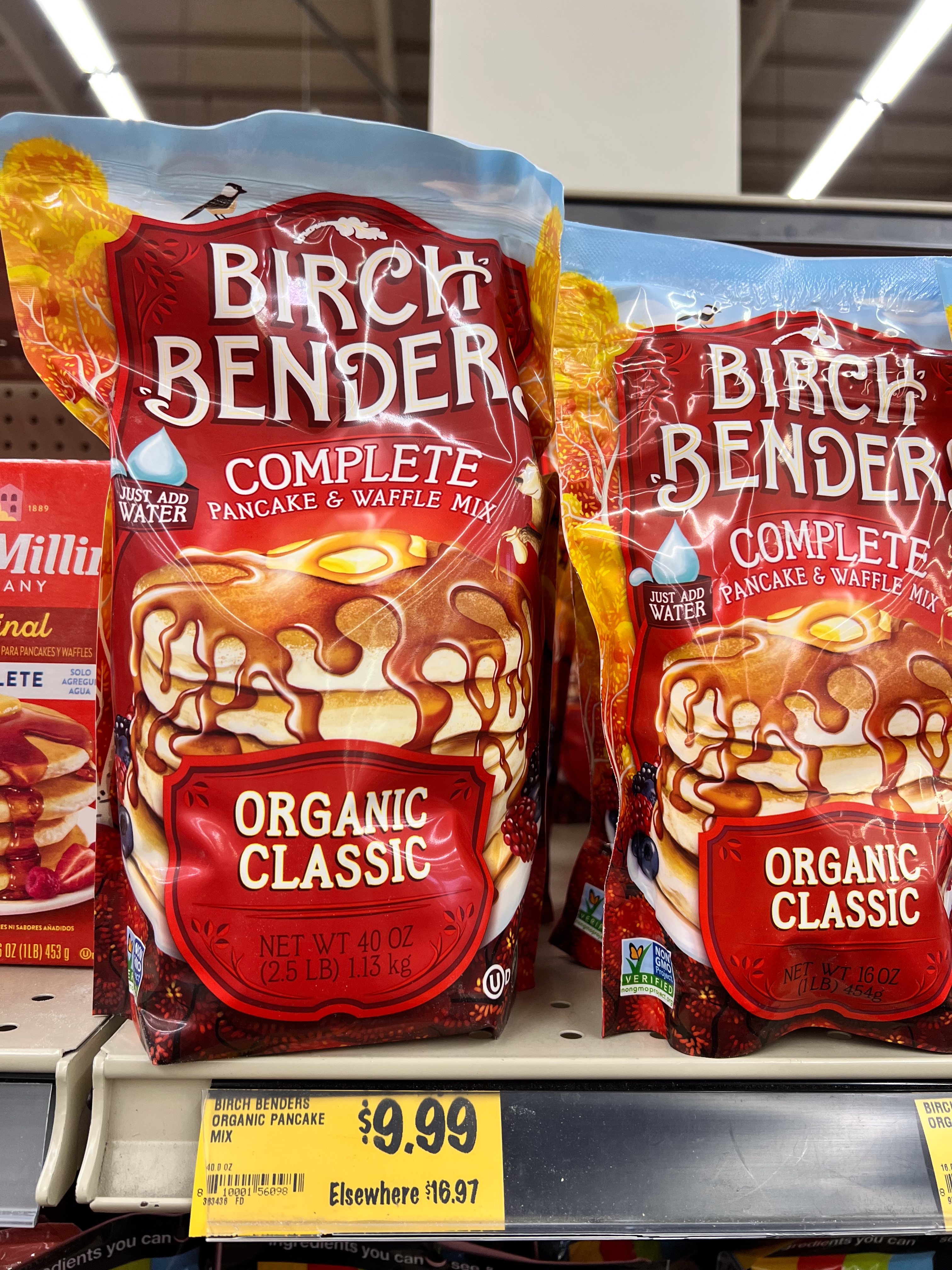 Bags of Birch Benders Organic Classic Pancake & Waffle Mix connected a store shelf. Price tag shows $9.99, marked down from $16.97