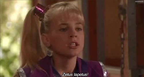 Young woman with a ponytail, shiny outfit, and a surprised expression saying &quot;Zetus lapetus!&quot;