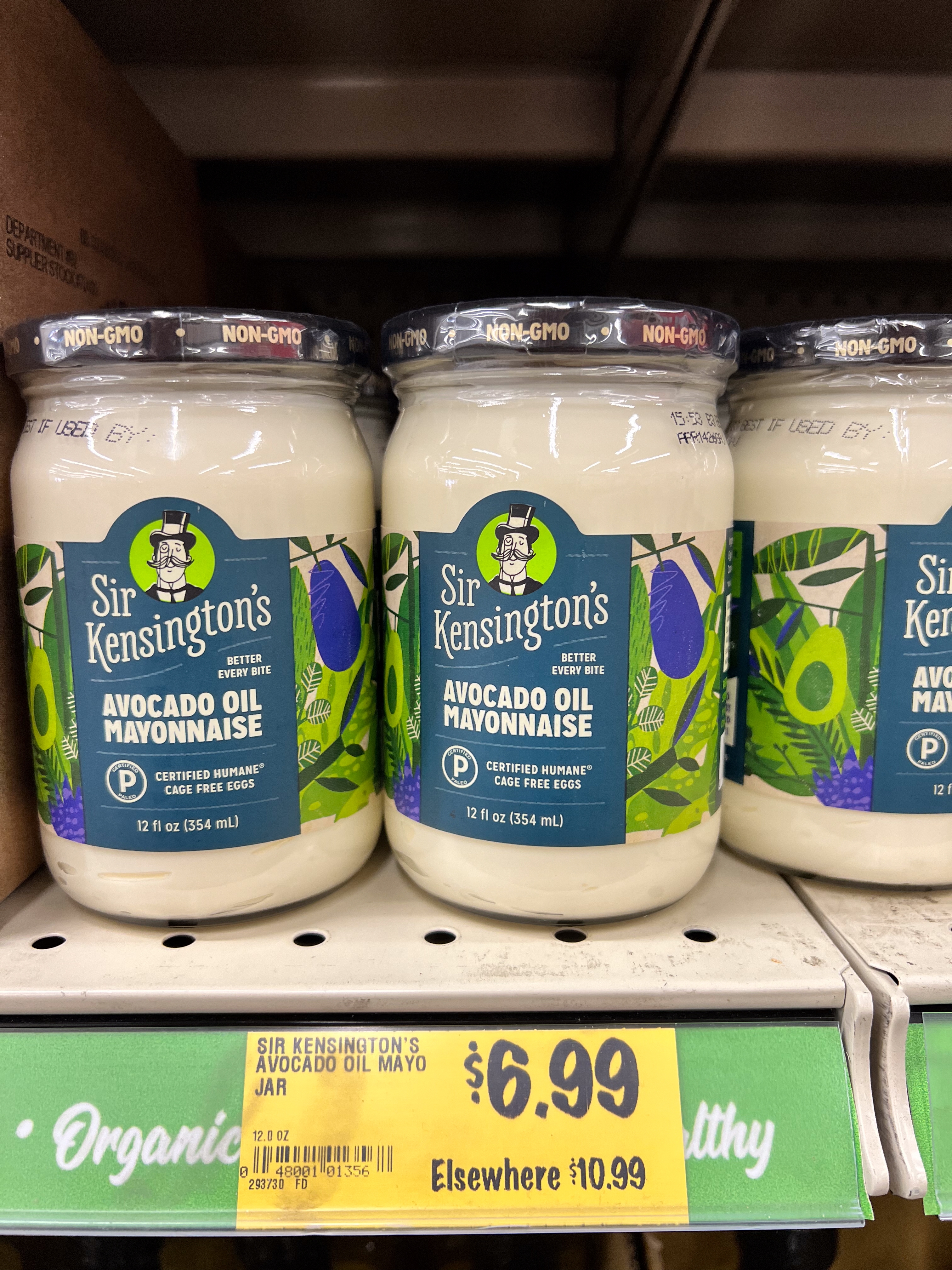 Jars of Sir Kensington's Avocado Oil Mayonnaise connected a store shelf, priced astatine $6.99 each, with a motion showing a higher rival terms of $10.99
