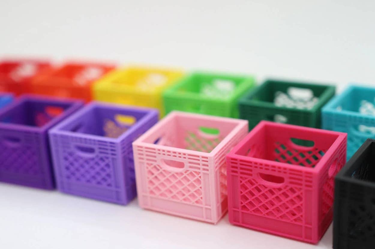 two rows of mini storage crates in different colors