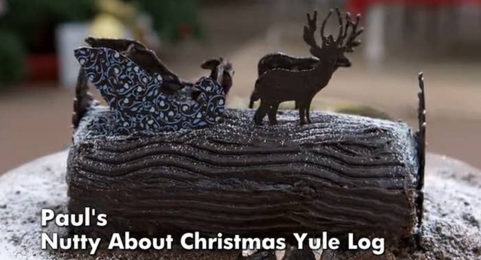 Chocolate Yule log with detailed decorations including a chocolate sleigh and reindeer. Text: "Paul's Nutty About Christmas Yule Log."