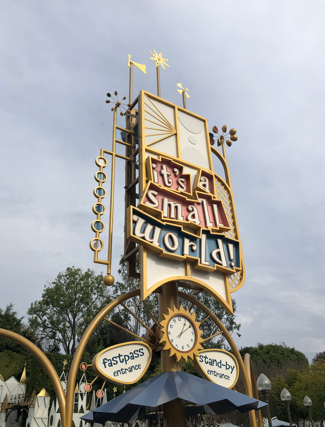 "It's a Small World" thrust   entranceway  motion   astatine  a taxable   park, featuring whimsical plan  elements and abstracted  Fastpass and Stand-by entrances