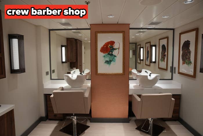 Salon interior with 2  styling stations, ample  mirrors, modern   chairs, and framed creation  connected  the walls. Clean and elegant design