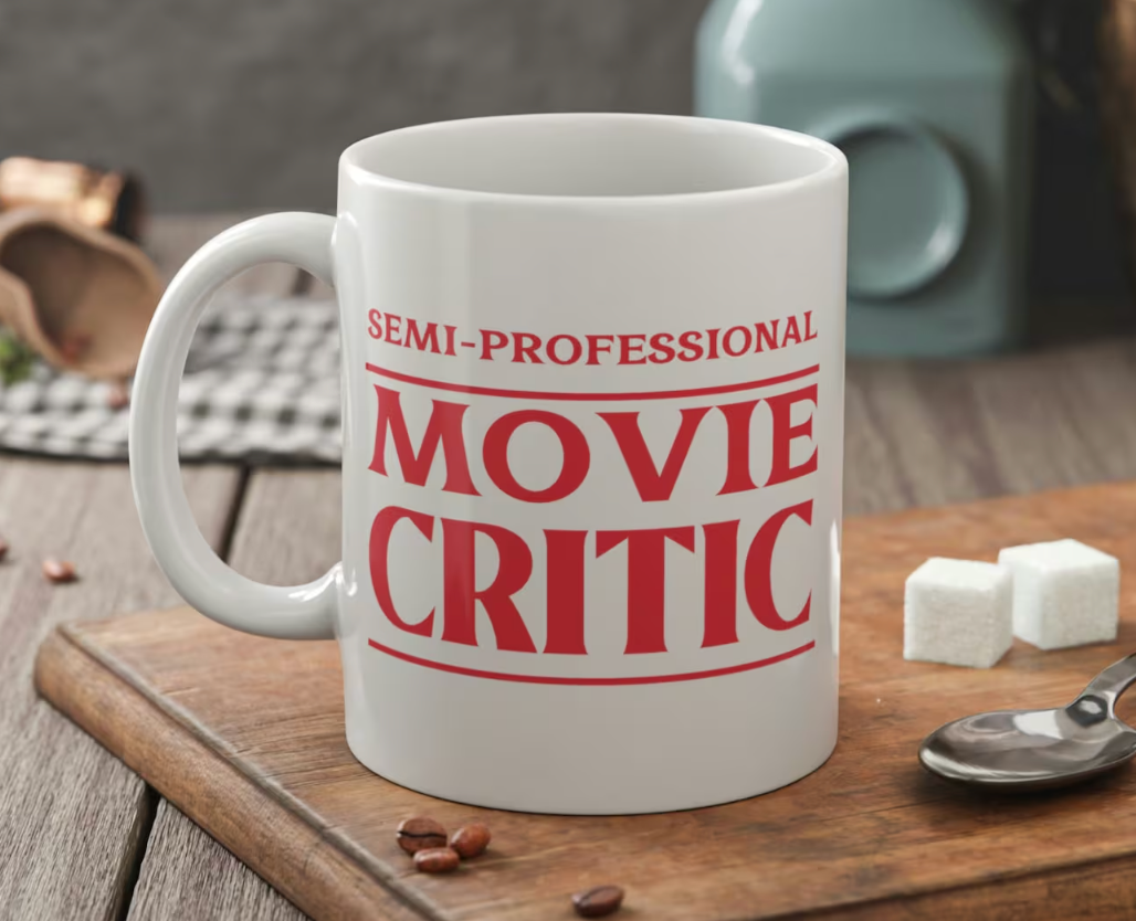  &quot;Semi-Professional Movie Critic.&quot; Coffee beans and sweetener  cubes nearby