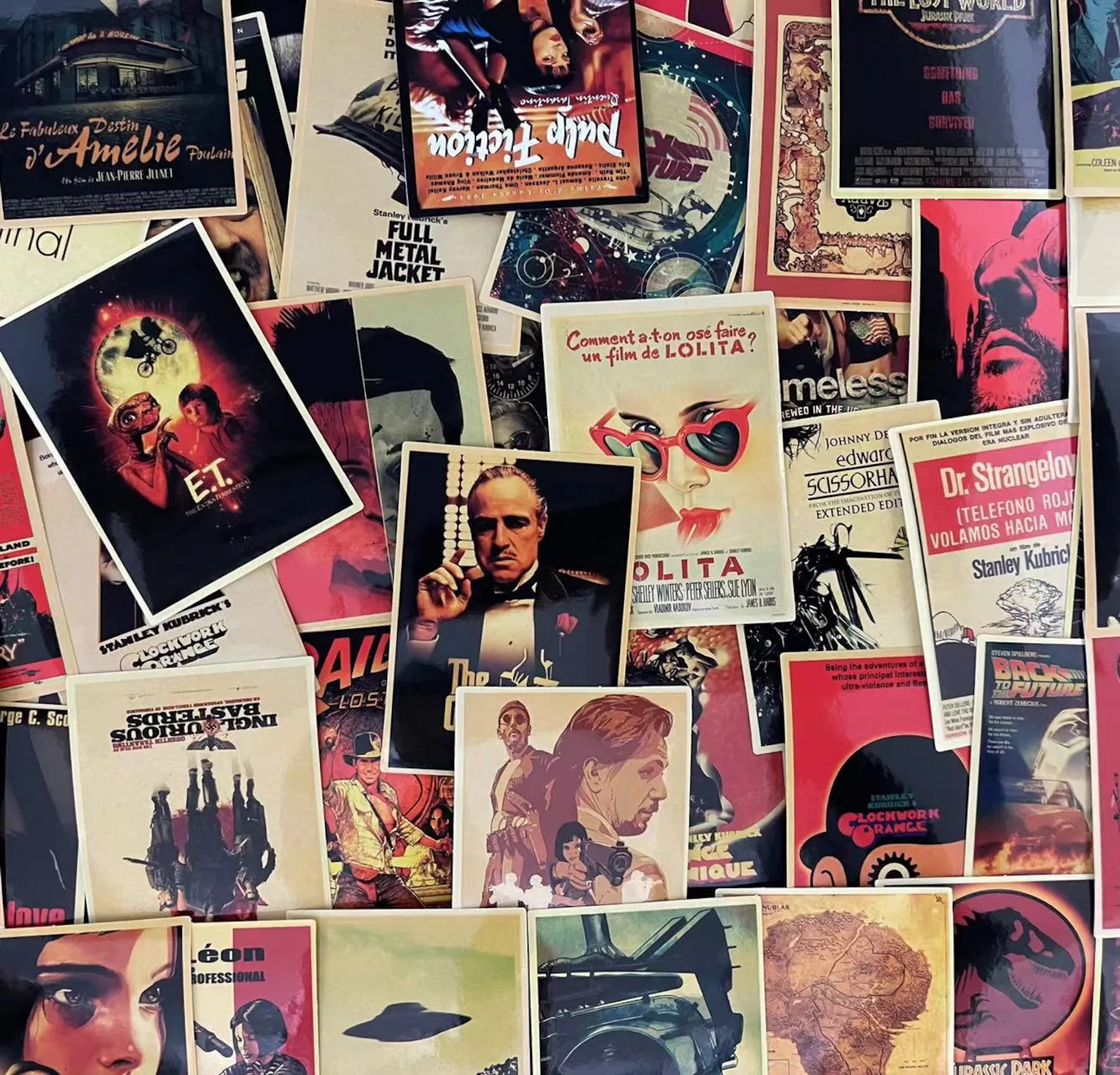 Collage of vintage movie   posters including iconic films similar  &quot;Amélie,&quot; &quot;E.T.,&quot; and &quot;The Godfather.&quot;