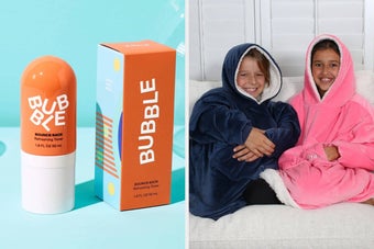 Makeup set with festive packaging and cozy oversized hoodies worn by two smiling children on a couch