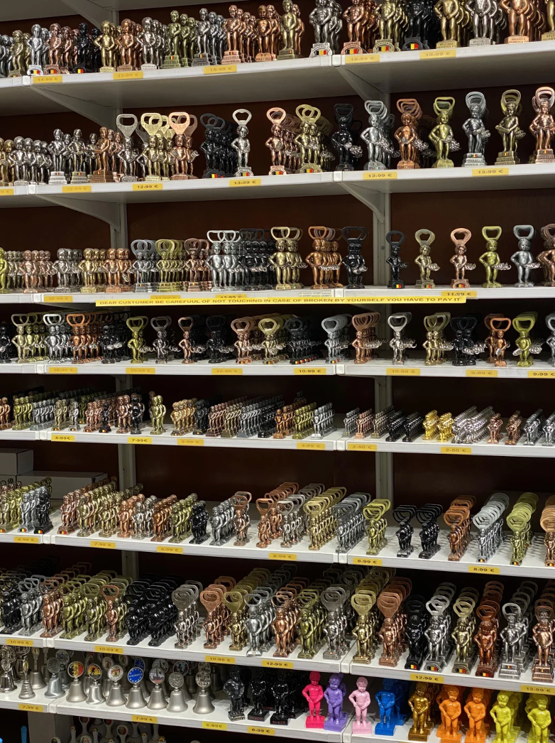 Shelves filled with a assortment  of trophies successful  antithetic  shapes and sizes, organized successful  rows