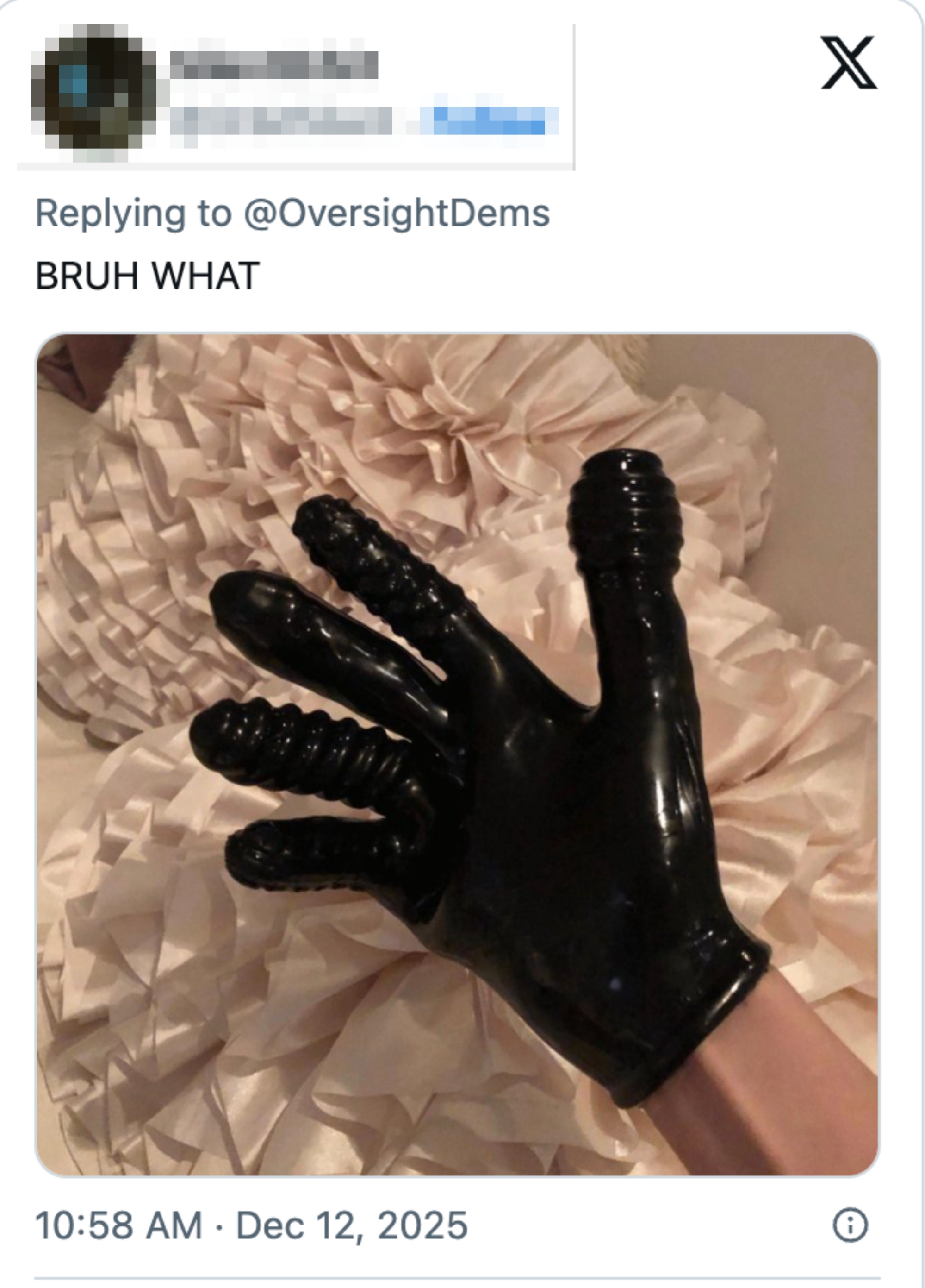 A idiosyncratic wearing a black, rubber mitt designed with ribbed fingers, shown against a textured achromatic background