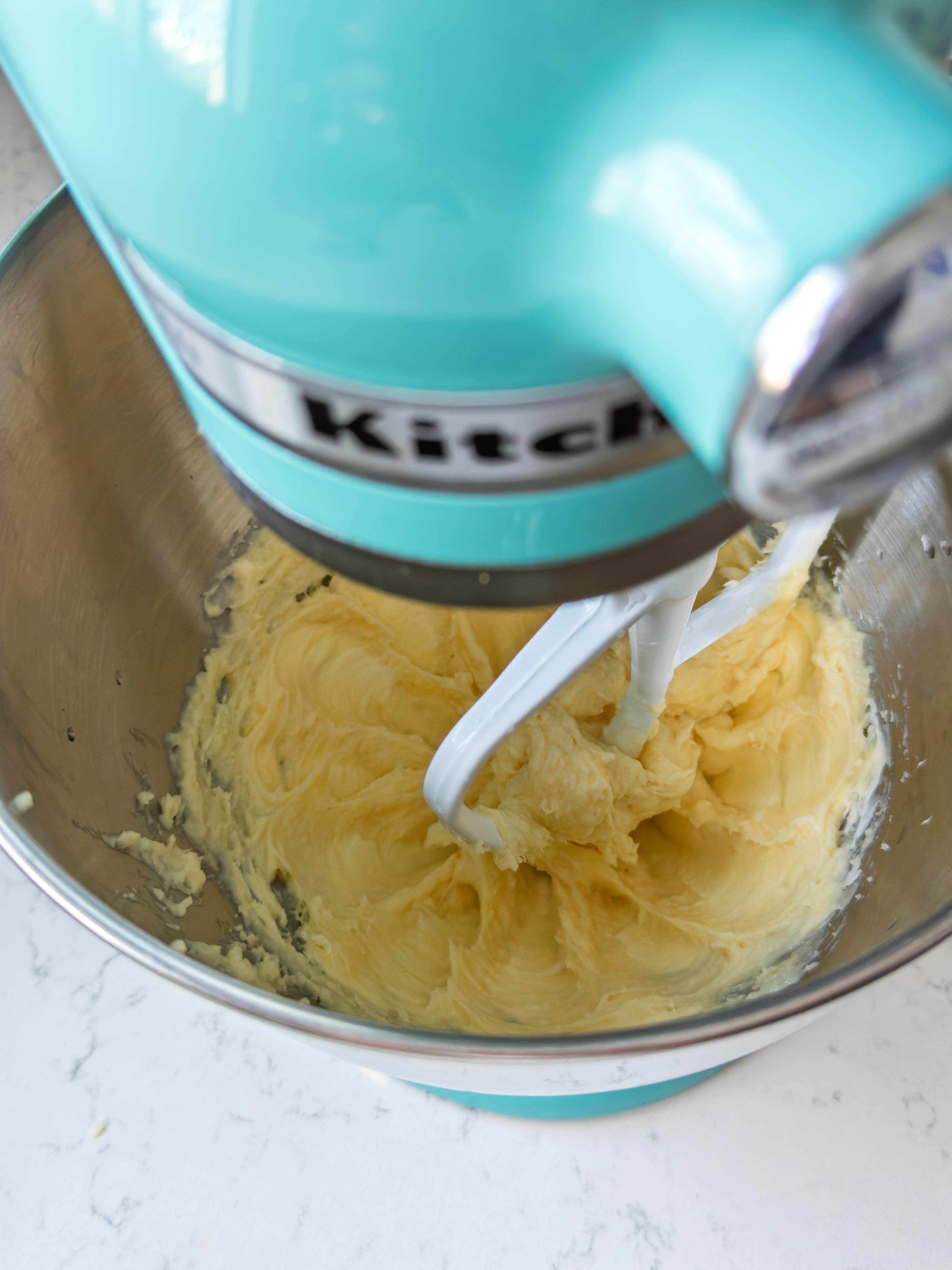 Stand mixer creaming butter and sugar in a mixing bowl