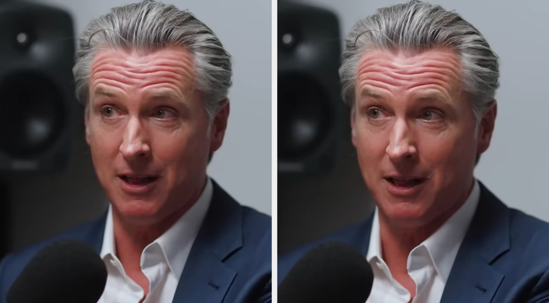 Person successful a suit speaking into a microphone during an interview