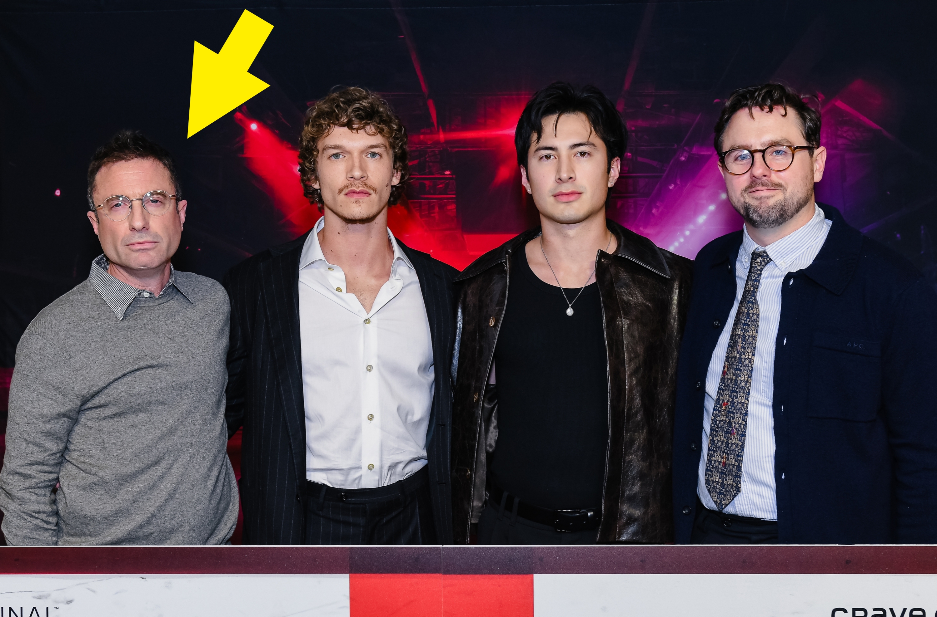 Four individuals basal unneurotic astatine an event, wearing a premix of casual and ceremonial attire, including jackets and button-up shirts