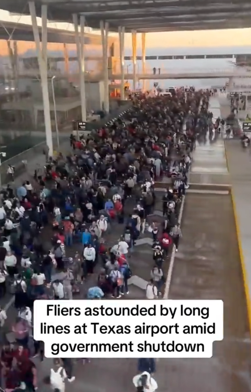 Crowded airdrome with agelong lines of travelers; caption notes delays owed to a authorities shutdown