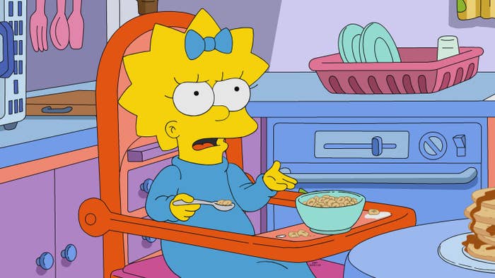 Maggie Simpson successful  a precocious   chair, wearing a onesie, holding a spoon, with a vessel  of cereal connected  the tray