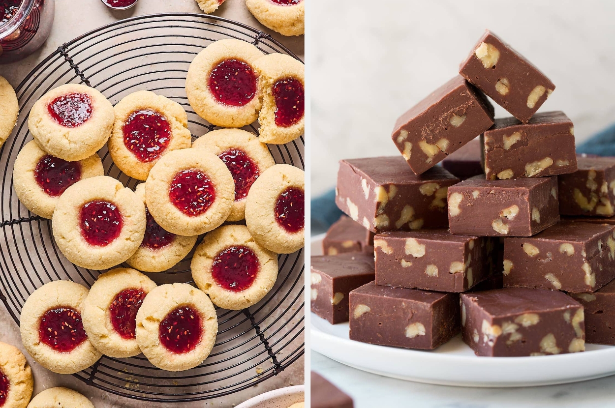 A variety of freshly baked thumbprint cookies with jam and stacked chocolate fudge with nuts on display