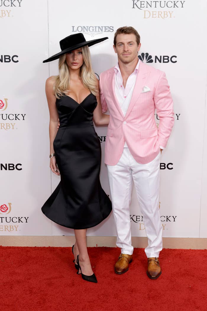 Alix Earle and Braxton Berrios connected  a reddish  carpet. The pistillate   is successful  a fitted achromatic  formal  and wide-brimmed hat. The antheral   wears a pinkish  blazer, achromatic  pants, and brownish  shoes