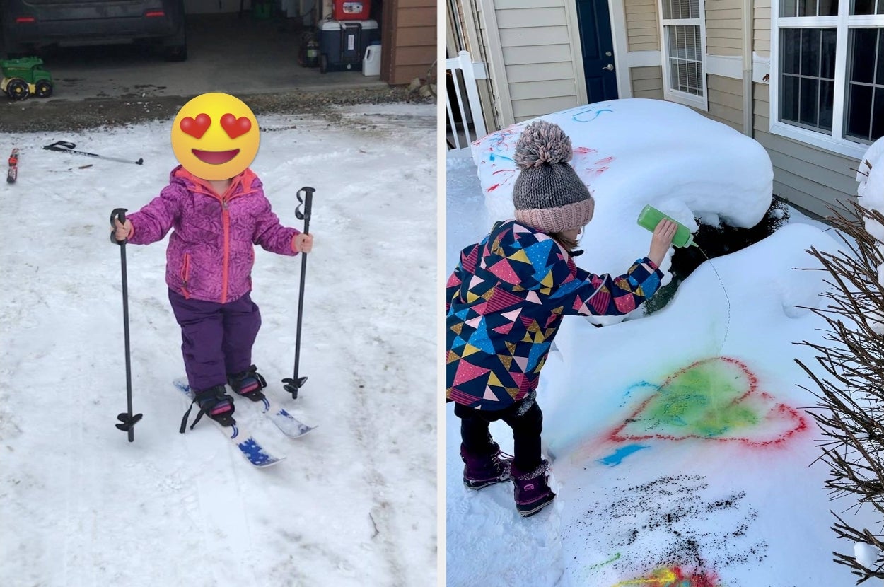 Child enjoying skiing and painting snow with colorful spray outside a house