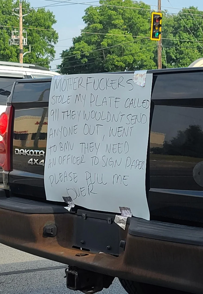  Person reports stolen licence  plate, claims 911 wouldn't help, suggests going to DMV, requests constabulary  to motion   paperwork and propulsion  them over
