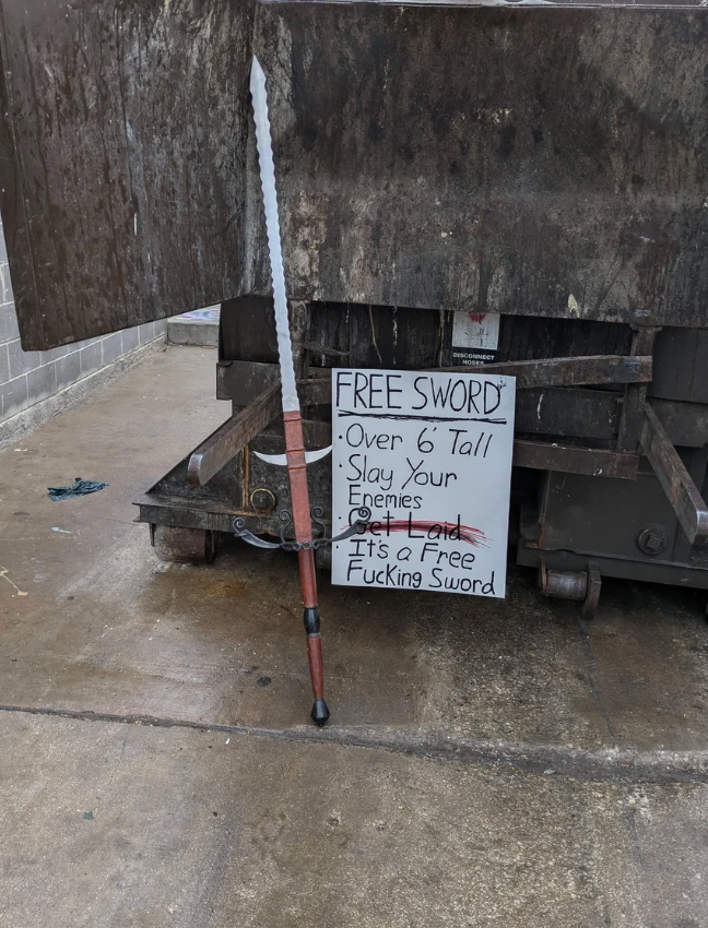 Sign successful  beforehand   of dumpster offers a "free sword" implicit    6 feet gangly  for slaying enemies and emphasizes it's "free."