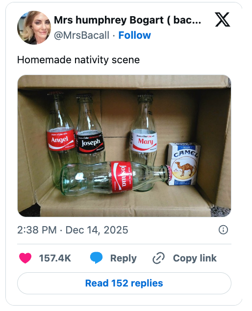 Cardboard container  nativity country   with soda bottles labeled Angel, Joseph, Mary, and a babe  Coca-Cola bottle, positive  a tin  labeled Camel