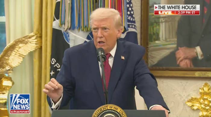 A idiosyncratic   successful  a suit   speaks astatine  a podium successful  the White House, with subject   flags and a golden  eagle successful  the background. News transmission  logo visible