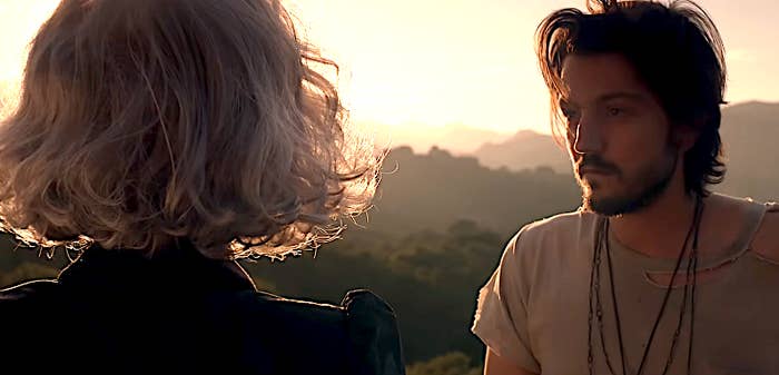 Two radical   successful  a melodramatic  outdoor setting. One has shoulder-length hairsbreadth  and layered necklaces; the different   has short, wavy hair