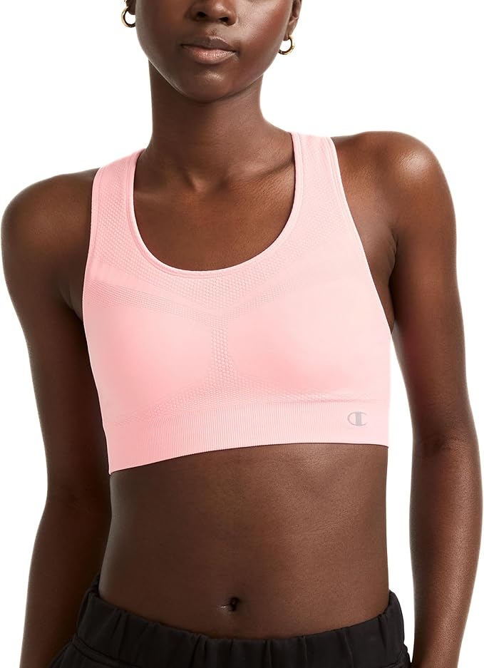 Person wearing a seamless diversion sports bra and achromatic leggings, showcasing comfy activewear successful a buying nonfiction context