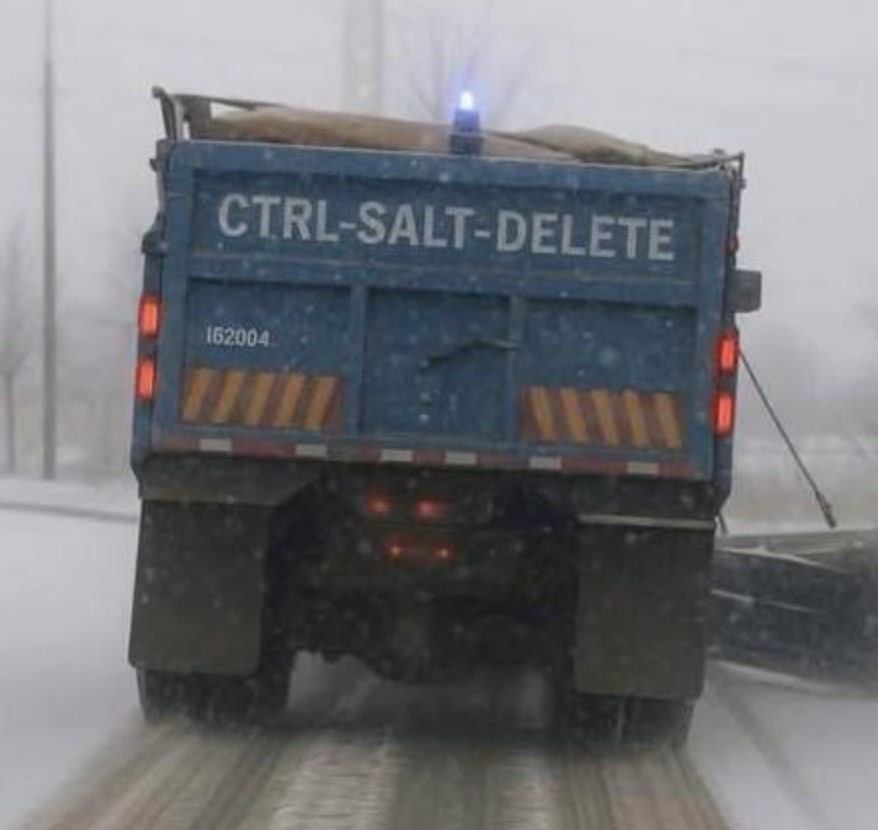 Snowplow with humorous "CTRL-SALT-DELETE" motion   clearing snowy roadworthy  successful  wintertime  conditions