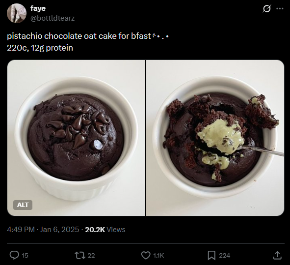 Two ramekins with pistachio cocoa  oat cake; 1  with cocoa  chips, the different   partially eaten with a spoon, showing greenish  pistachio filling