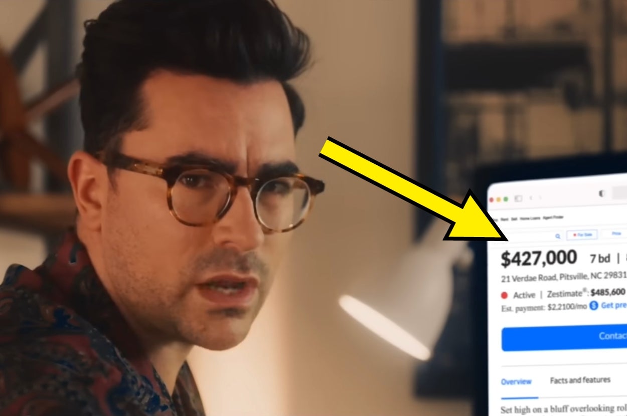 Person wearing glasses looks at a $427,000 listing on a laptop. An arrow highlights the price