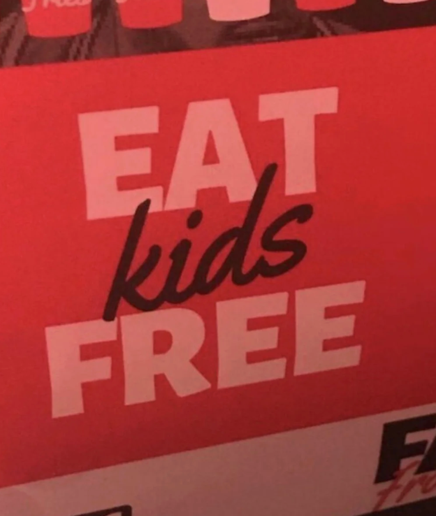 "Eat Kids Free" substance   connected  a promotional sign