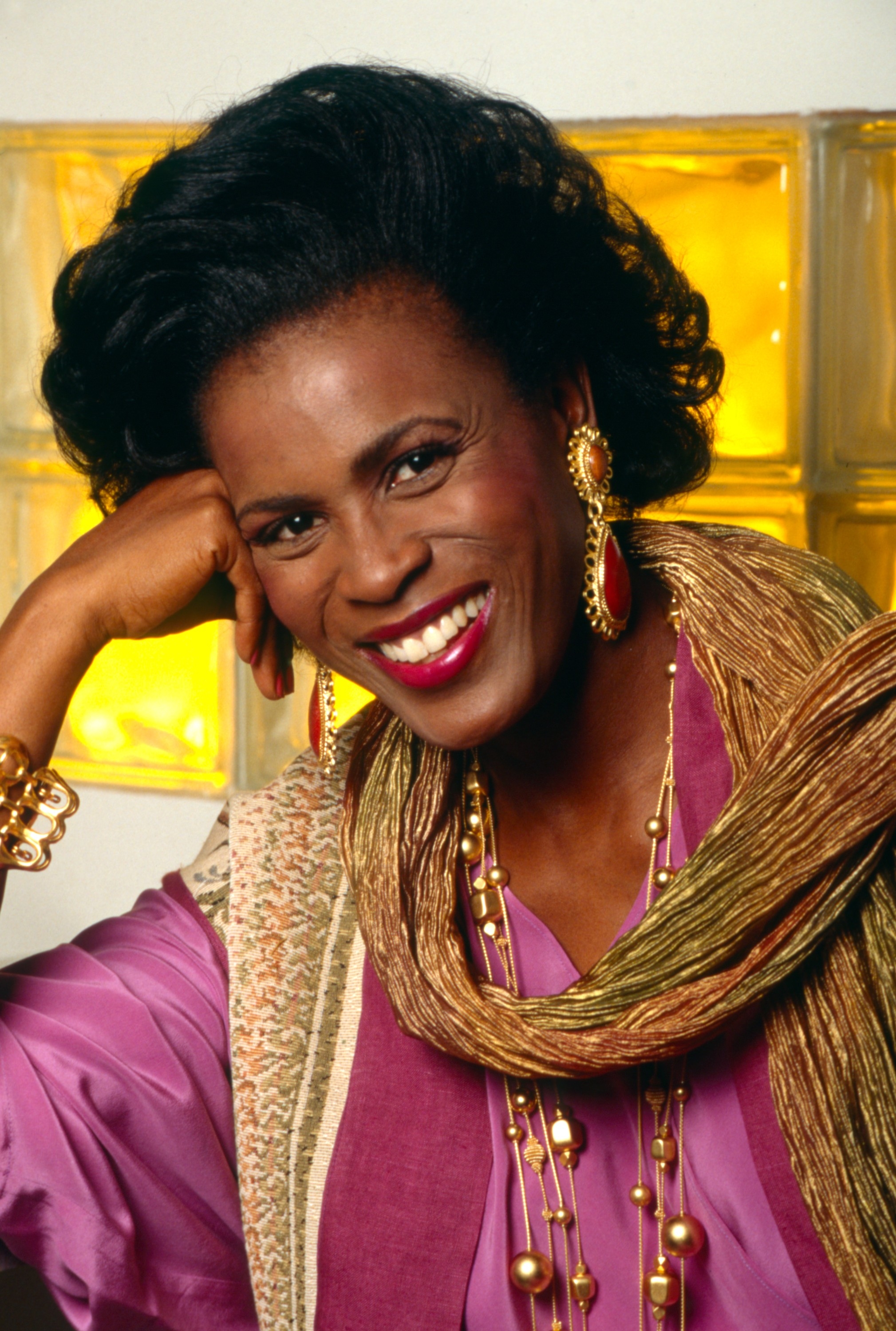 Hubert smiling in a press shot for the show